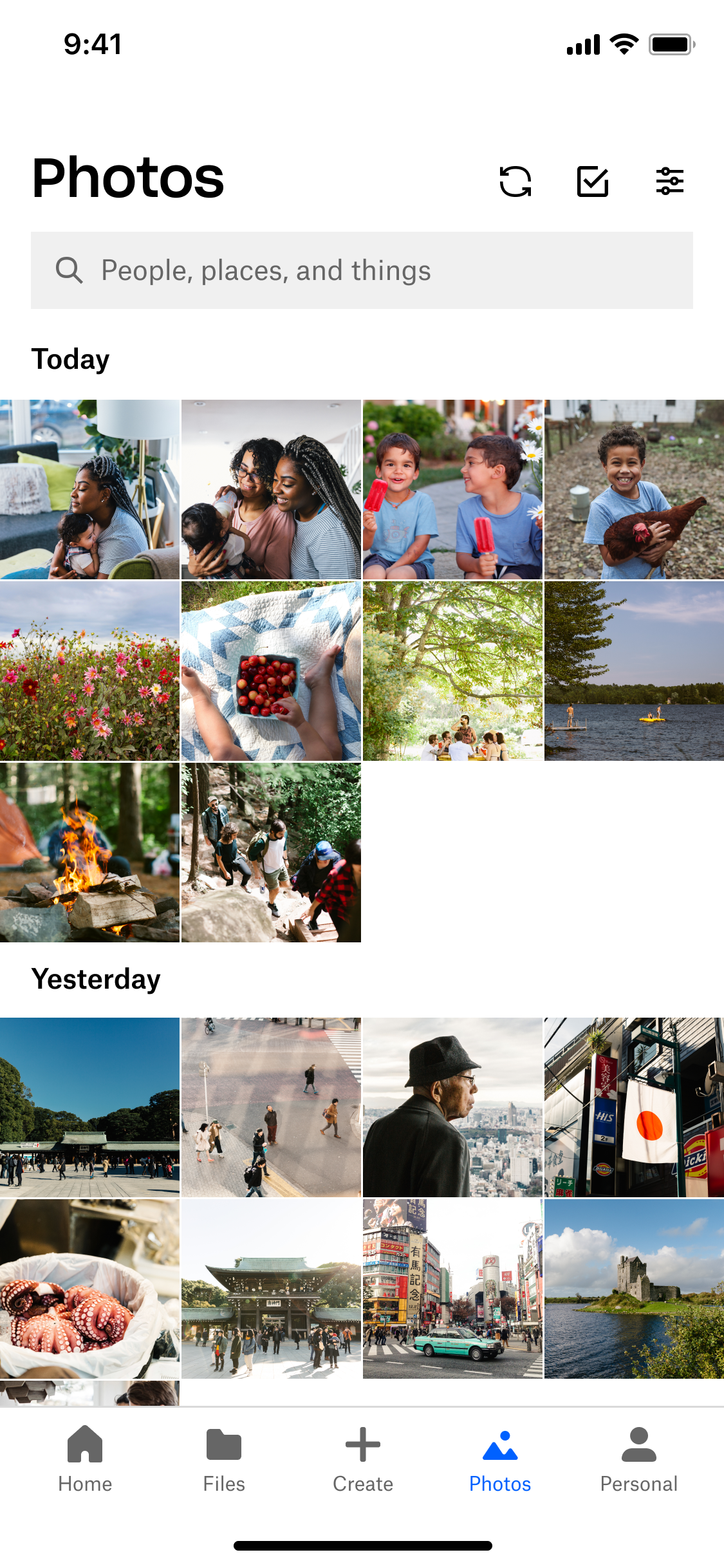 Redesigned Dropbox Photos tab with a large title, filter control, and cleaner date sections.